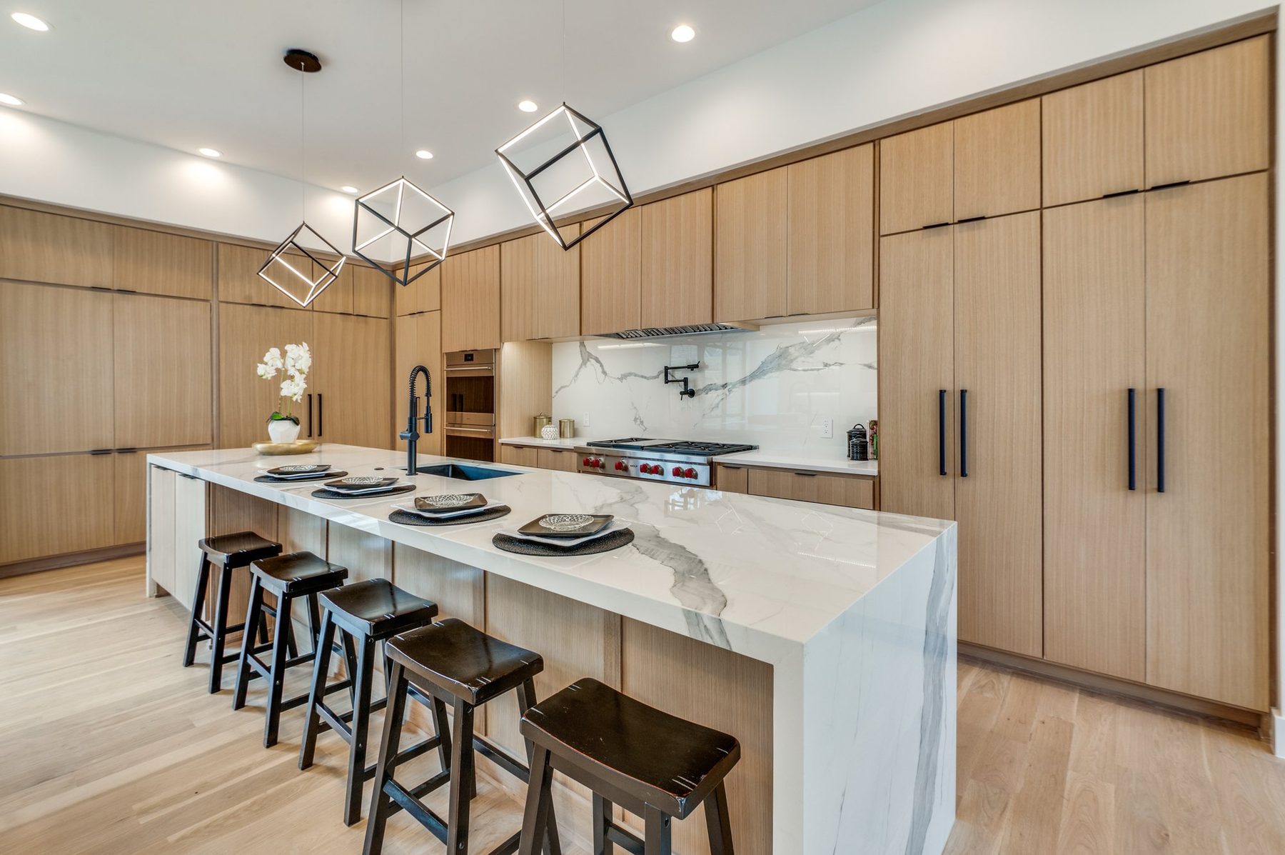 Kitchen with marble waterfall island